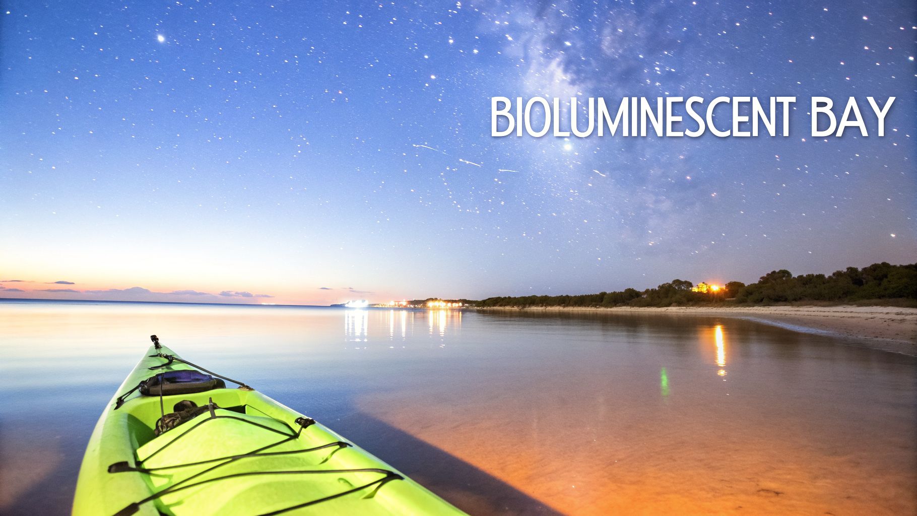 A bright green kayak rests on a sandy beach under a dazzling starry sky with the Milky Way and distant shore lights.