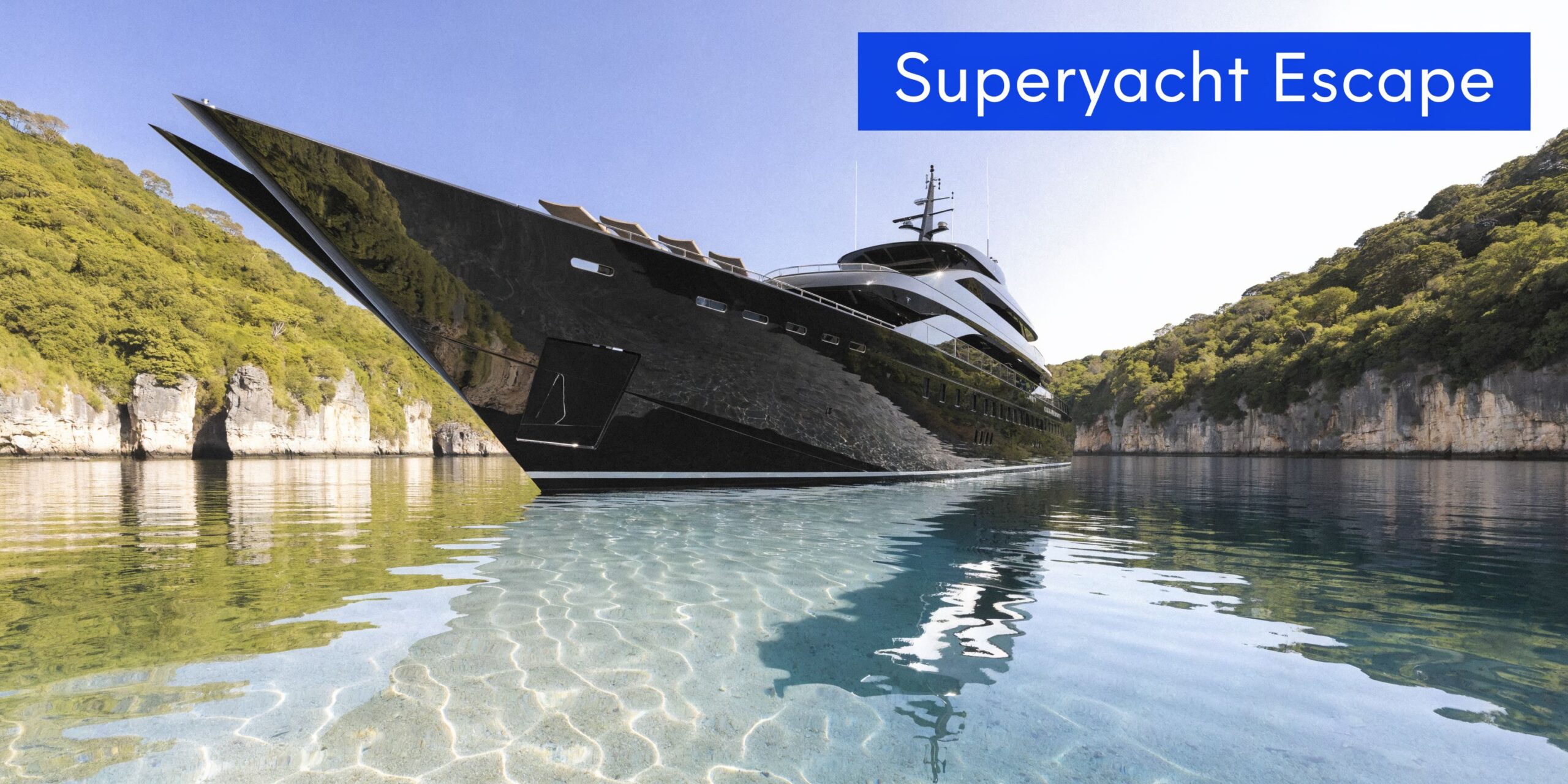 A sleek black superyacht anchored in a tranquil turquoise bay surrounded by lush green cliffs.