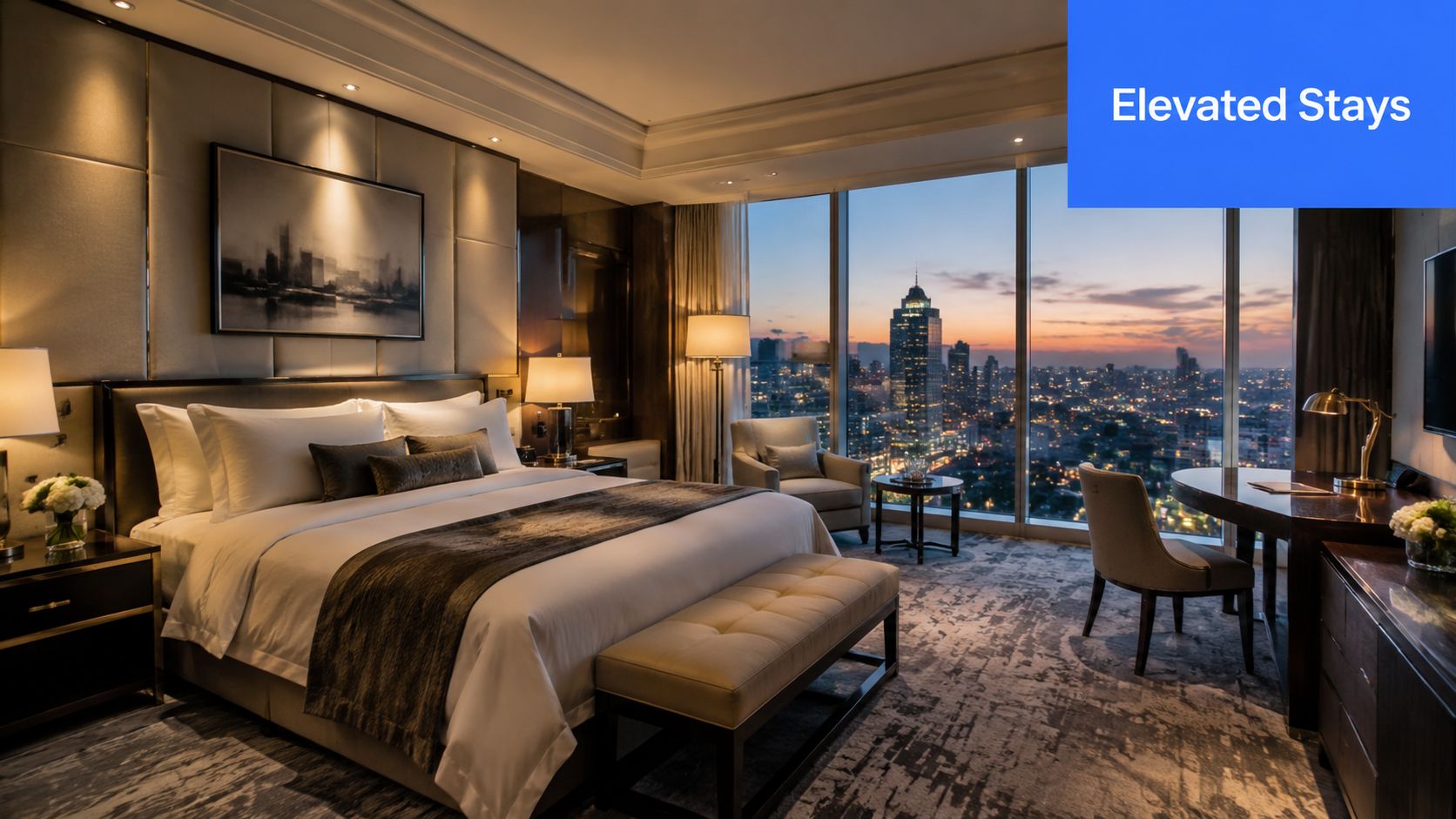 A luxurious modern hotel bedroom with a city skyline view at sunset and elegant decor.