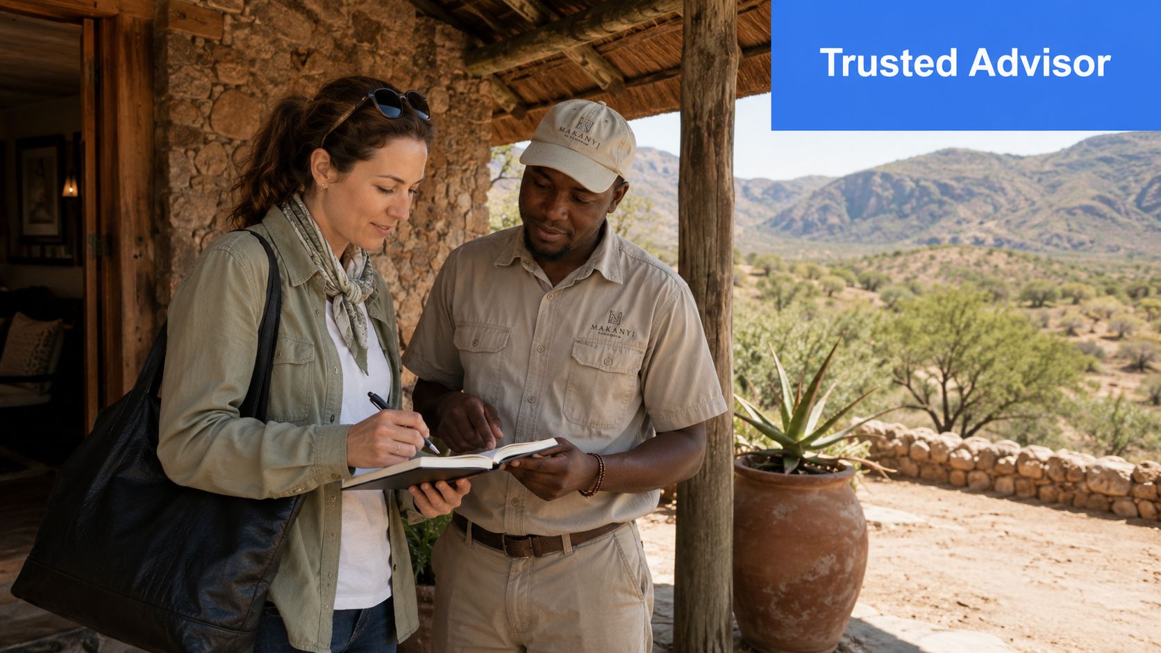A female traveler taking notes while a Makanyi Lodge guide provides local safari information outdoors.