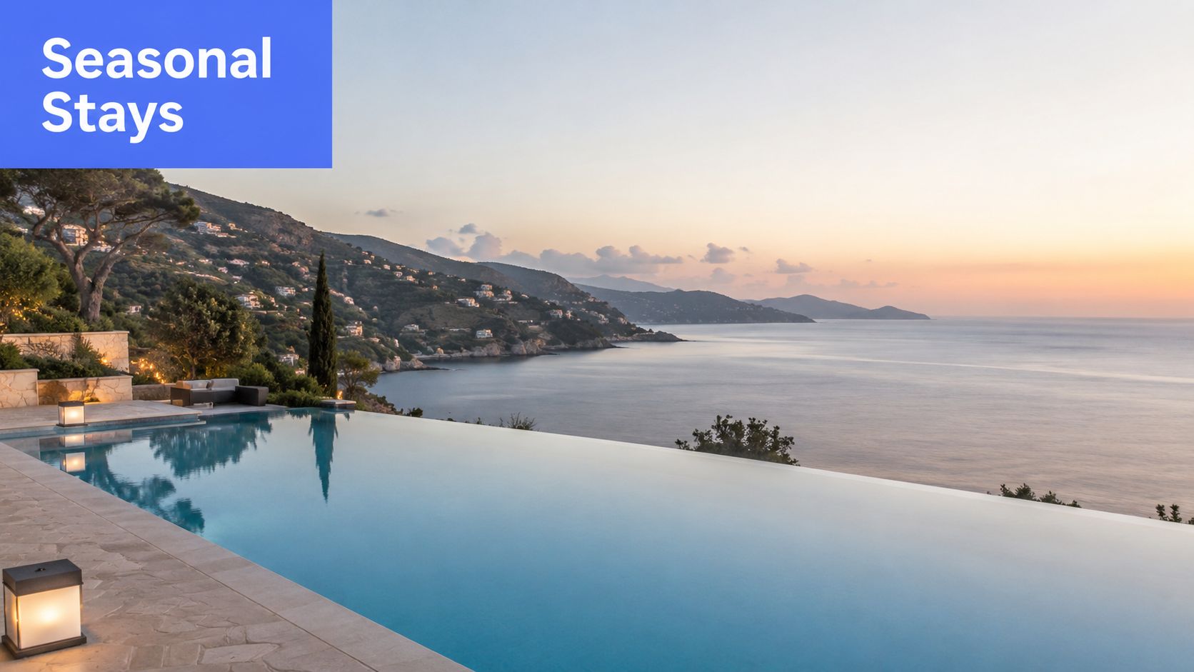 A luxurious infinity pool overlooking a scenic Mediterranean coastline during a calm and beautiful golden sunset.