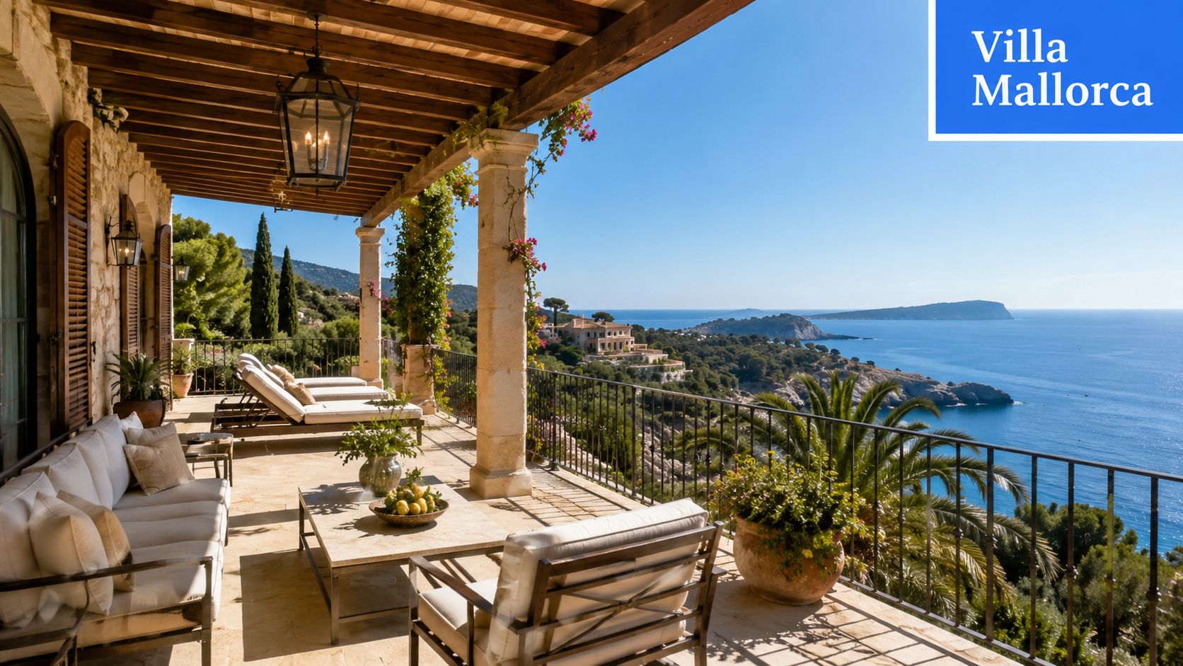 A luxurious terrace overlooking the Mediterranean sea at a sun-drenched villa in Mallorca with lounge furniture.