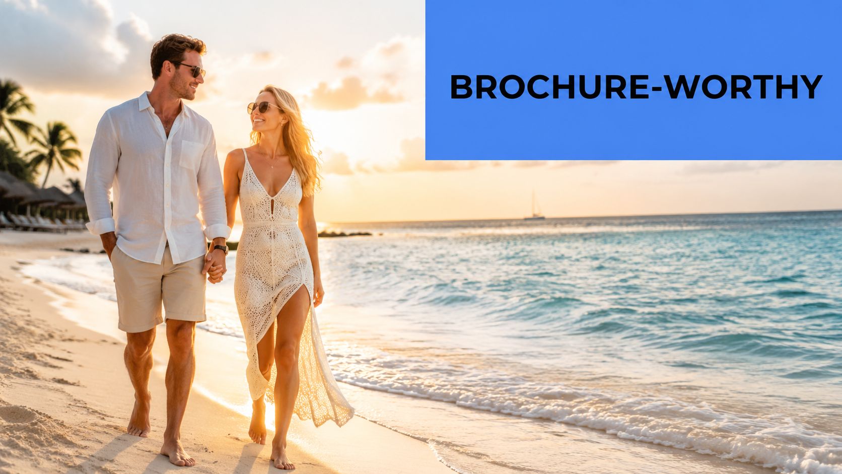 A happy couple walking hand in hand along a sandy beach during a beautiful tropical sunset.
