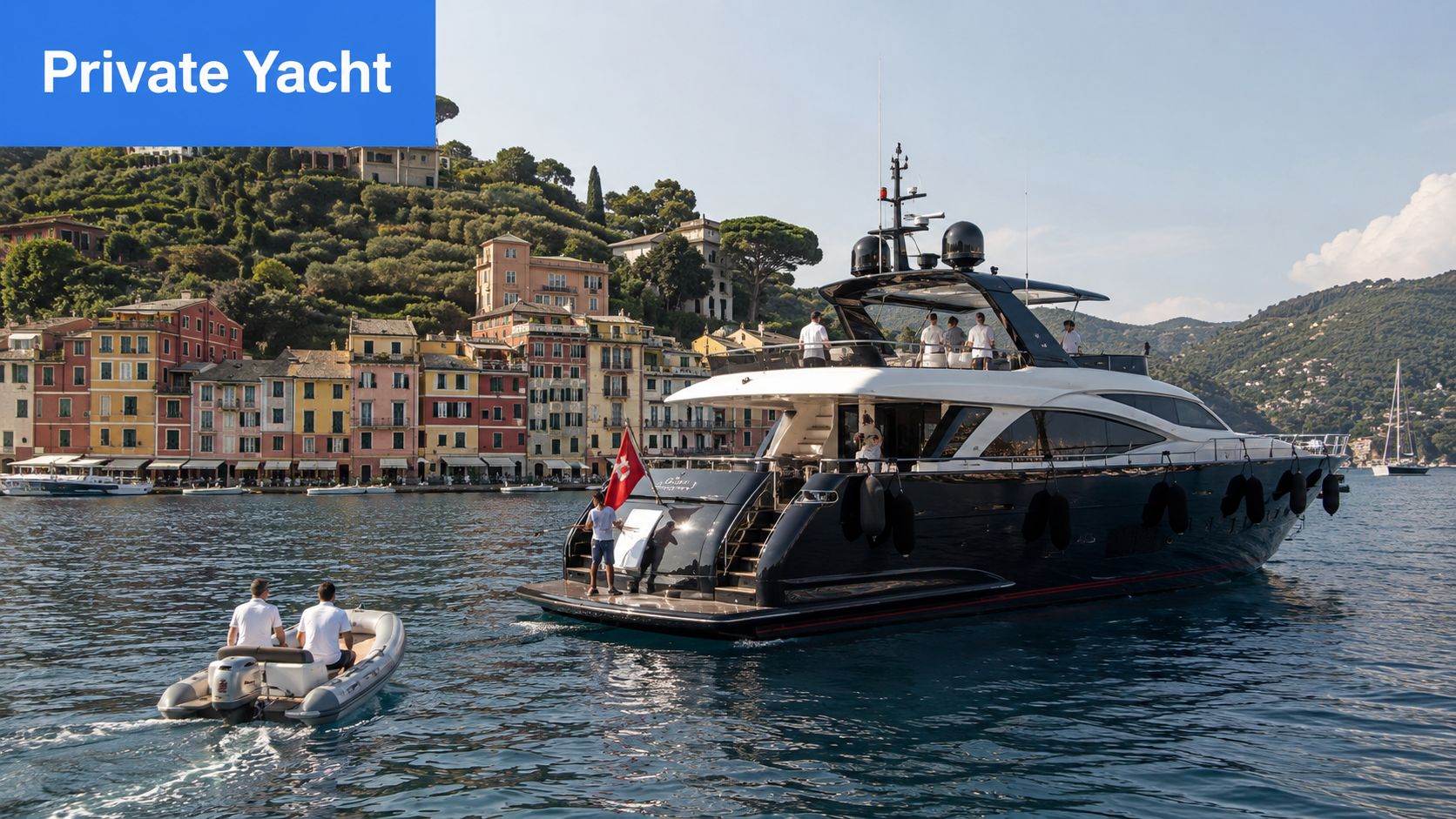 A luxurious private yacht docked near the colorful buildings along the waterfront of Portofino in Italy.